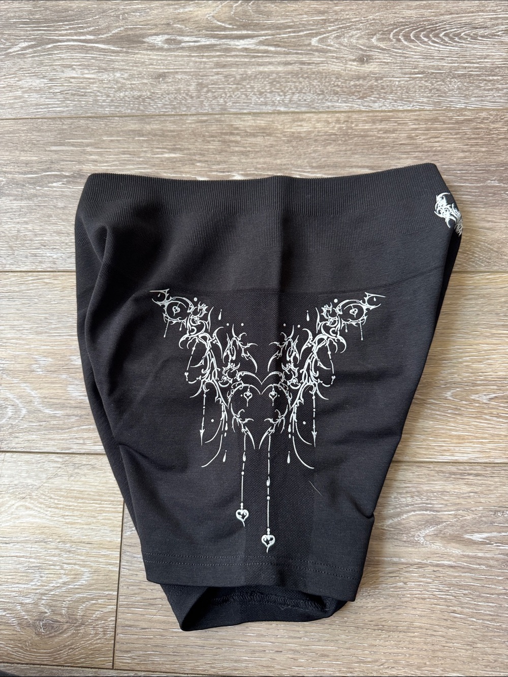 Black Women’s Bike Shorts with White Scroll Accent - Picture 2 of 4